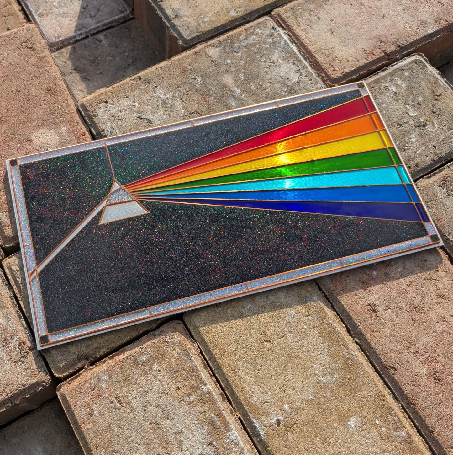 Finished artwork made using a prism resin art template