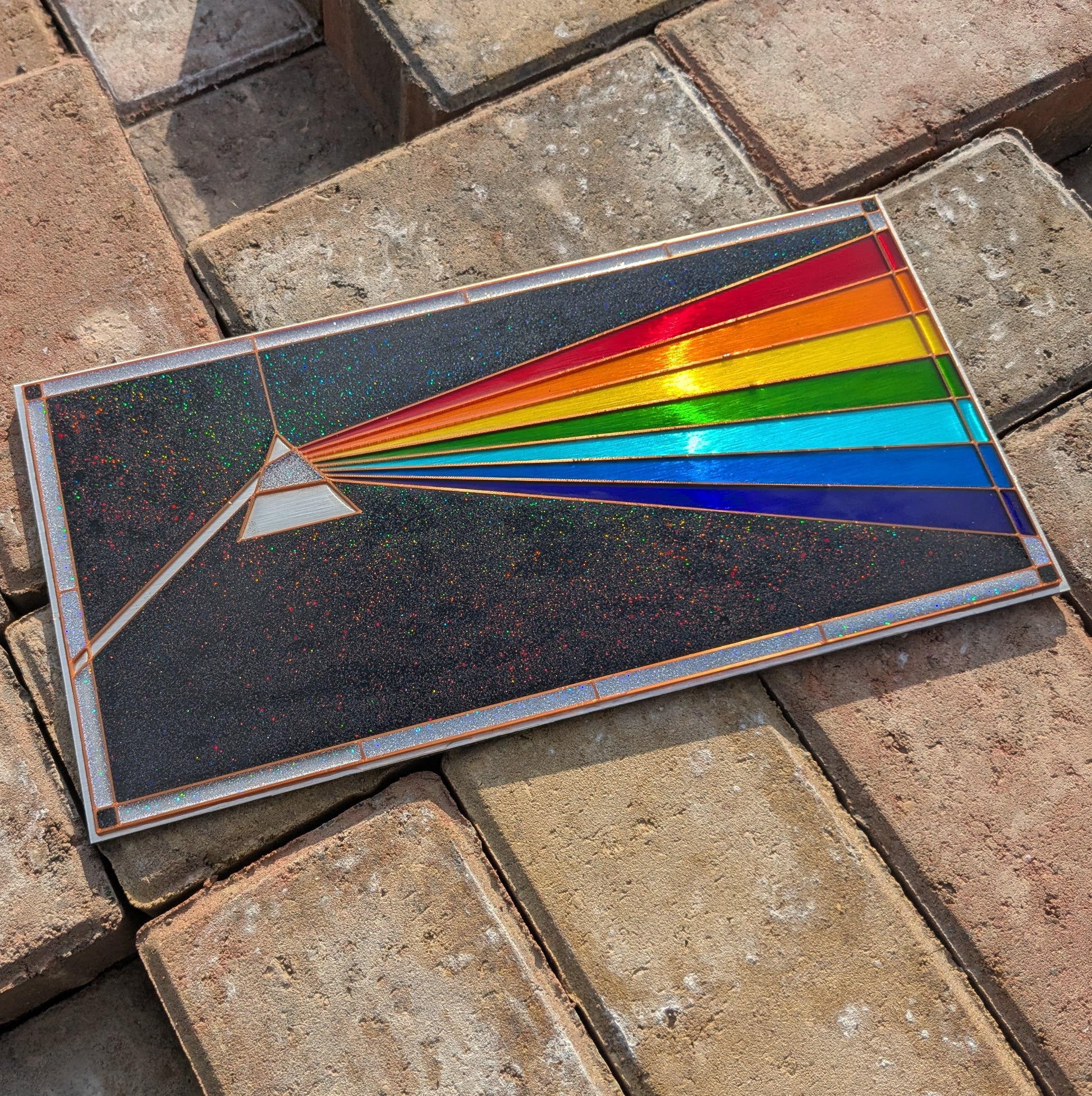 Finished artwork made using a prism resin art template